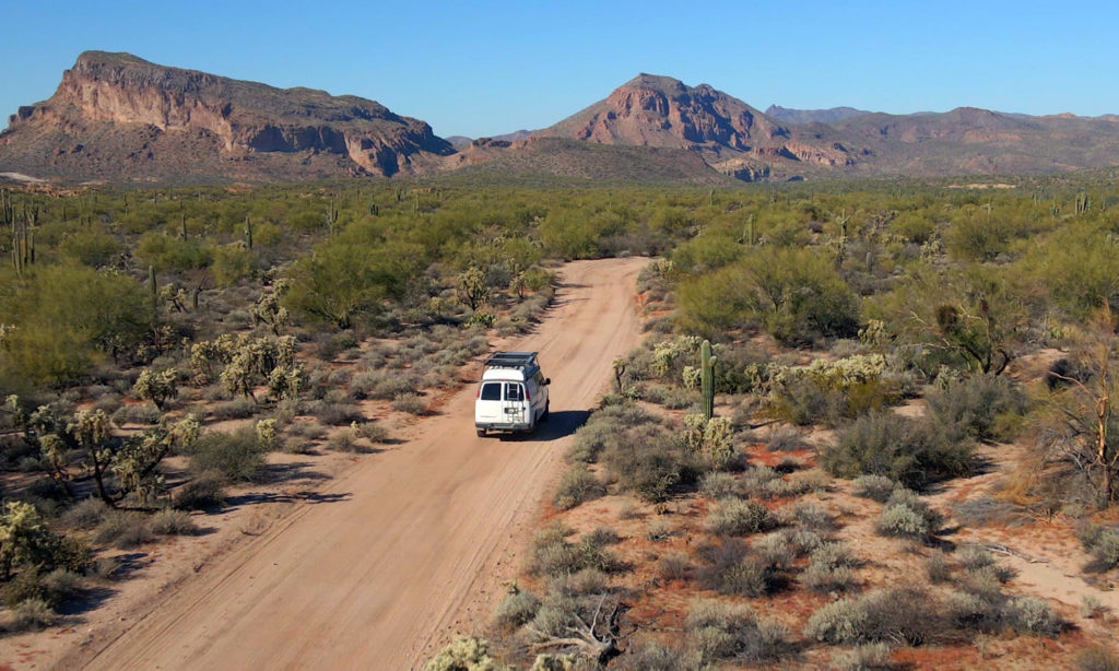 Van driving Cochran road in Sonoran Desert Arizona