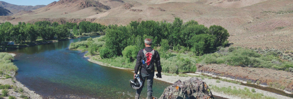 Riding Solo mountain overlook river Idaho