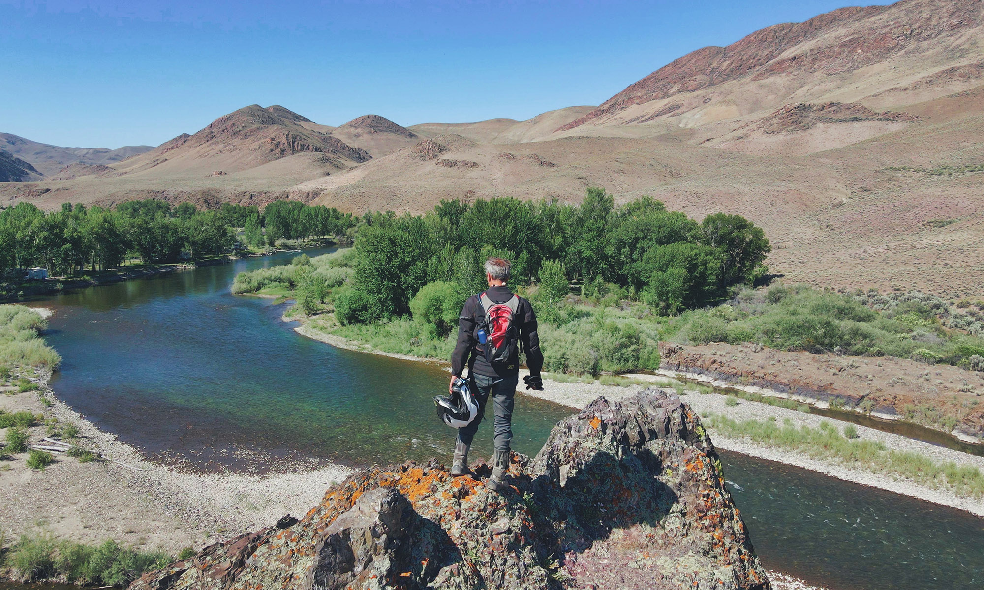 Riding Solo mountain overlook river Idaho