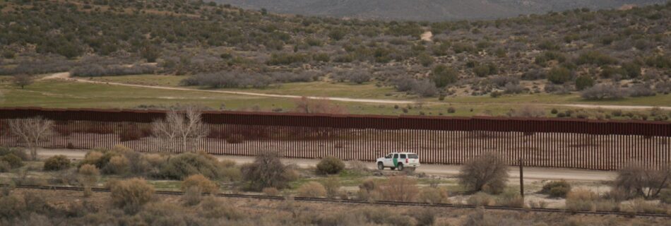 US border patrol on border wall near Mexico