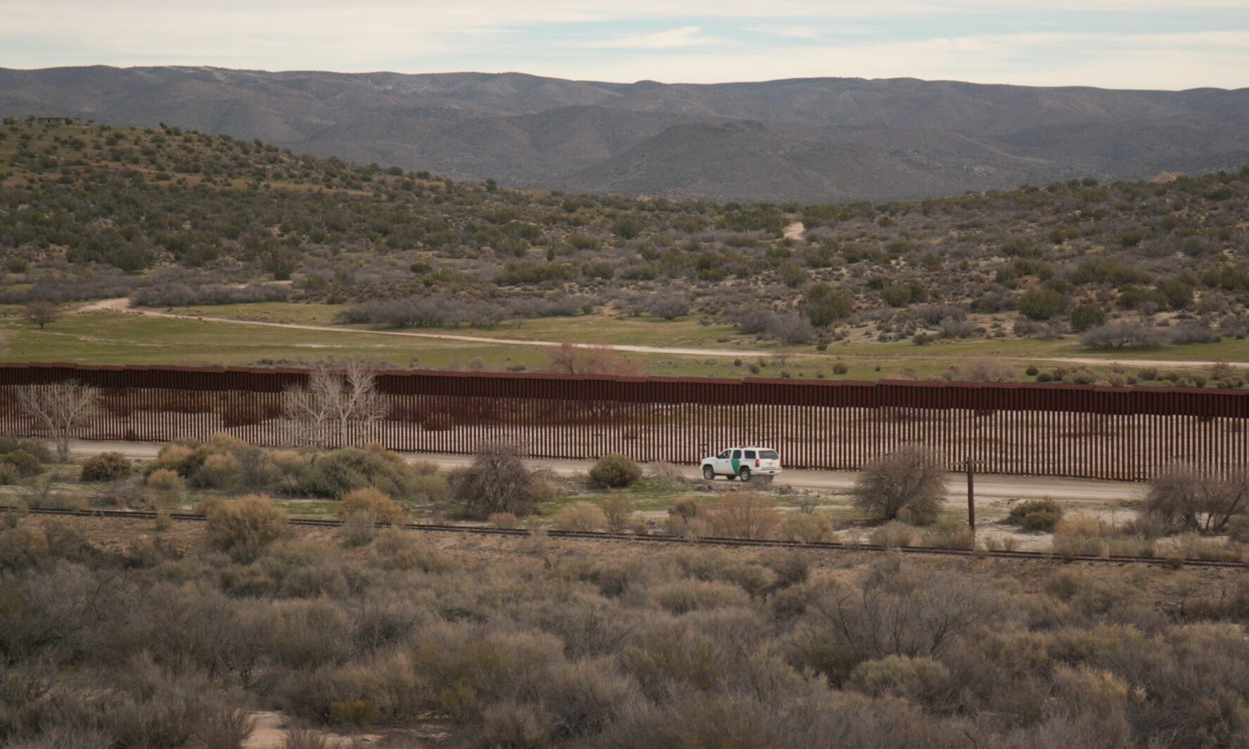 US border patrol on border wall near Mexico