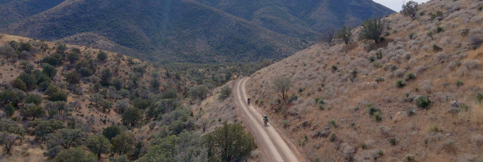 Two motorcyclist riding on Middlemarch Road in Arizona