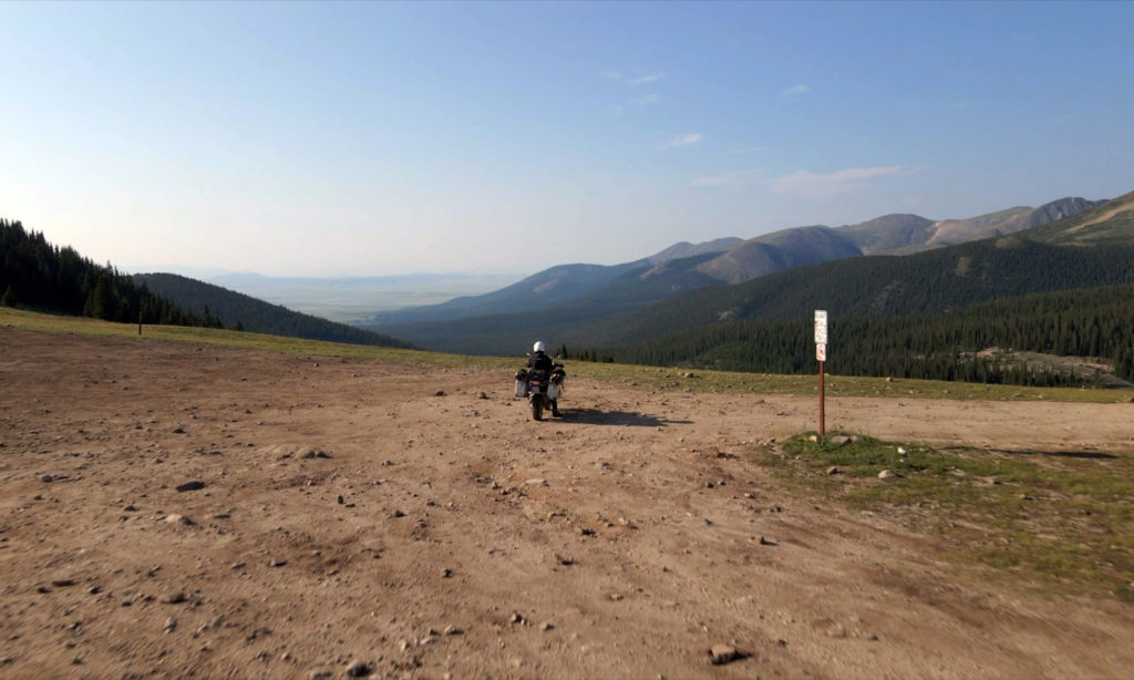 Solo rider on top of Georgia Pass Colorado