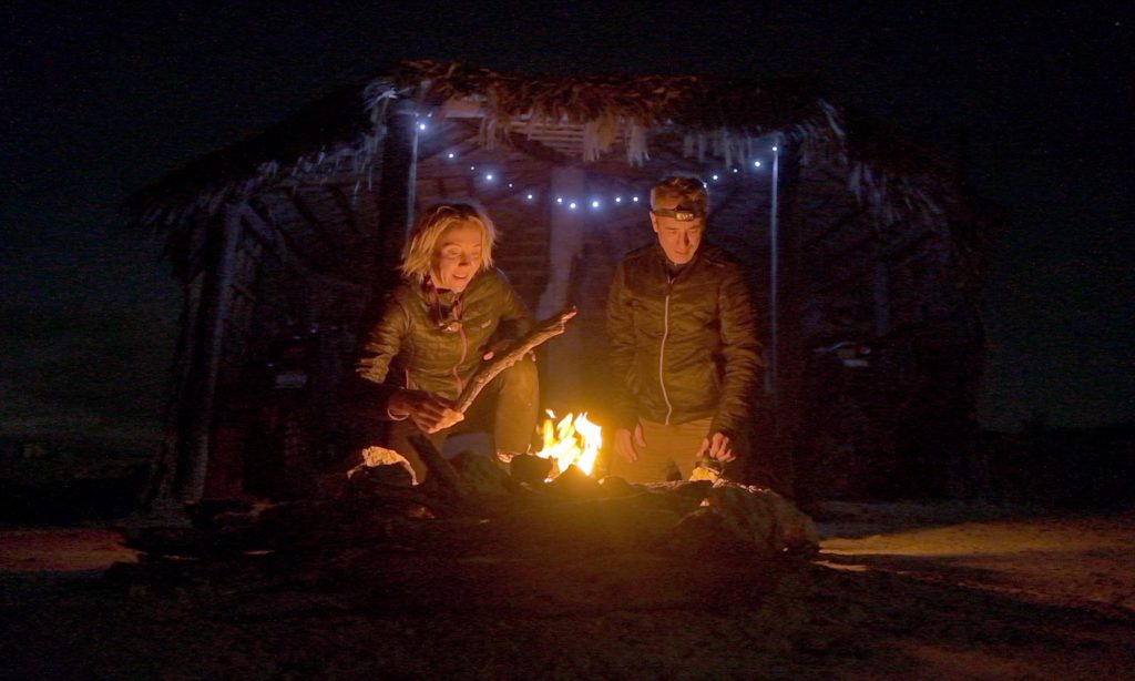 Sterling and Eva at a campfire