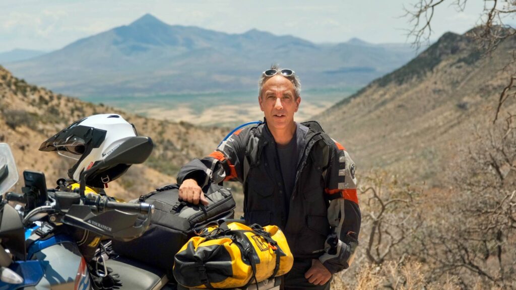 Sterling Noren riding BMW GS motorcycle in Arizona