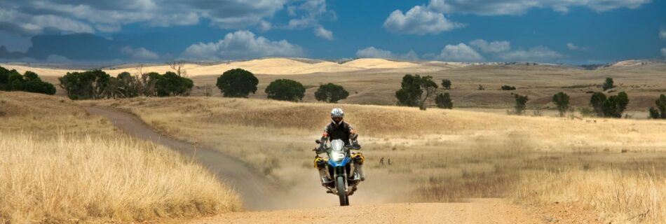 Sterling Noren riding BMW GS motorcycle in Arizona