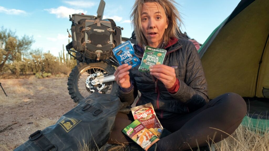 Eva Rupert preparing to cook Thanksgiving dinner in the desert motorcycle camping