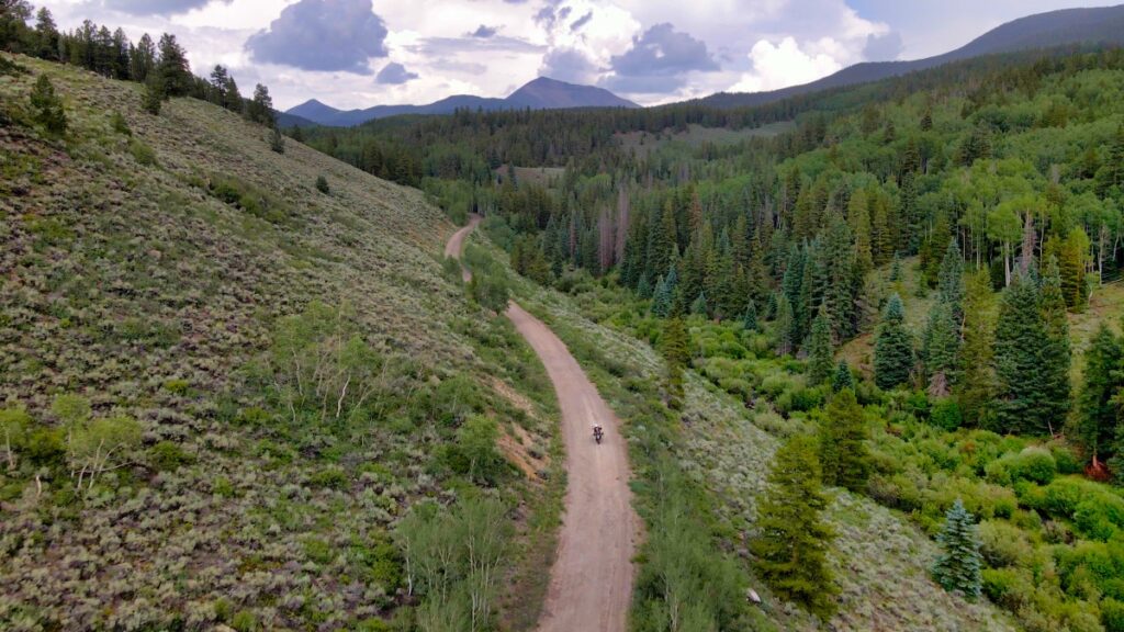 Sterling Noren riding motorcycle up Marshall Pass COlorado