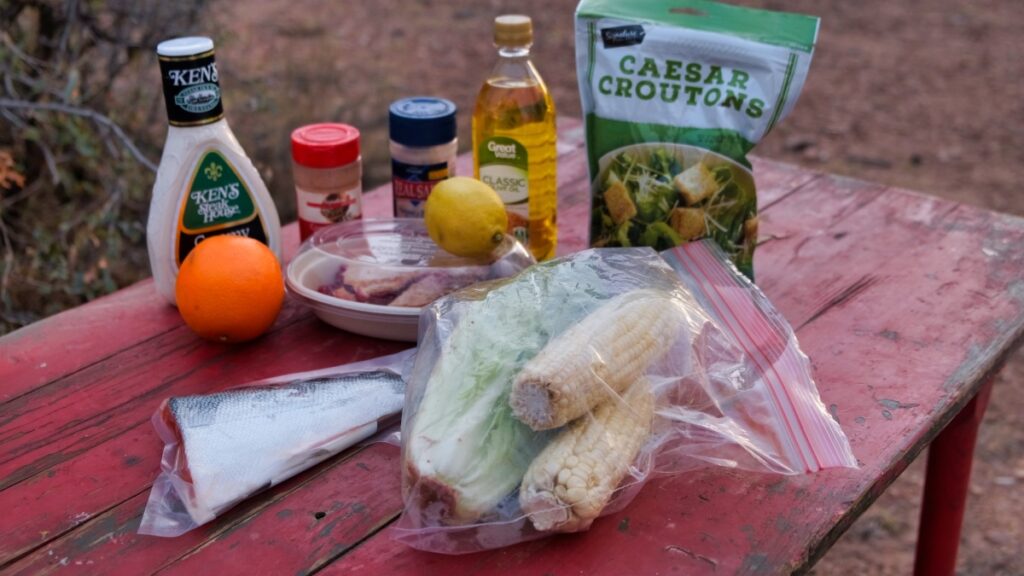 ingredients for dinner salmon lettuce corn