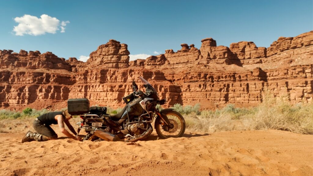 Eva Rupert motorcycle stuck in the sand in Utah