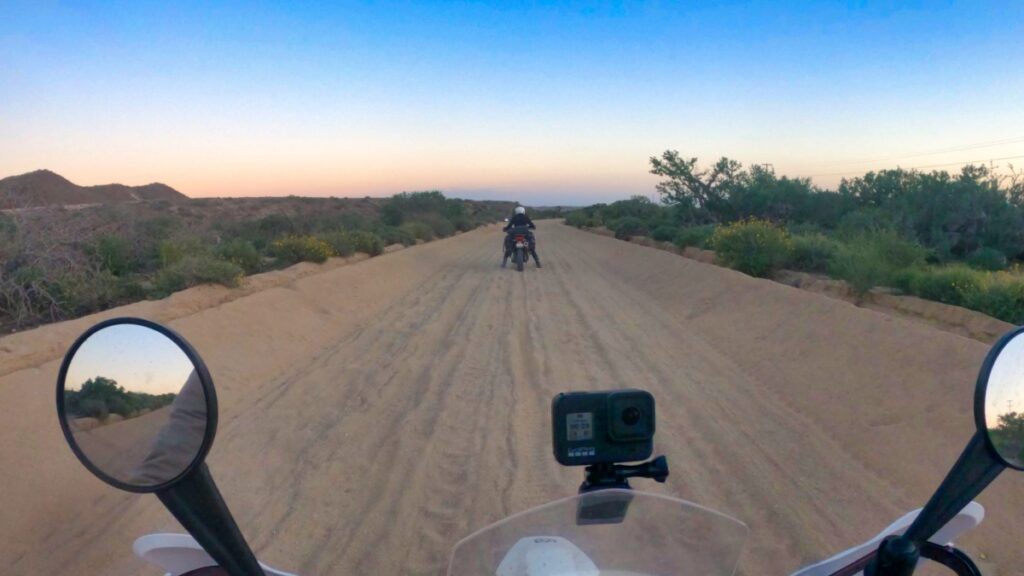 Motorcycling on sandy road in Baja California