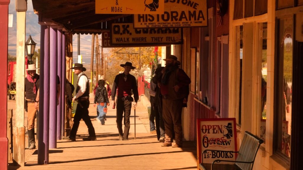 Silhouette of a cowboy and other people on the streets of Tombstone, Arizona