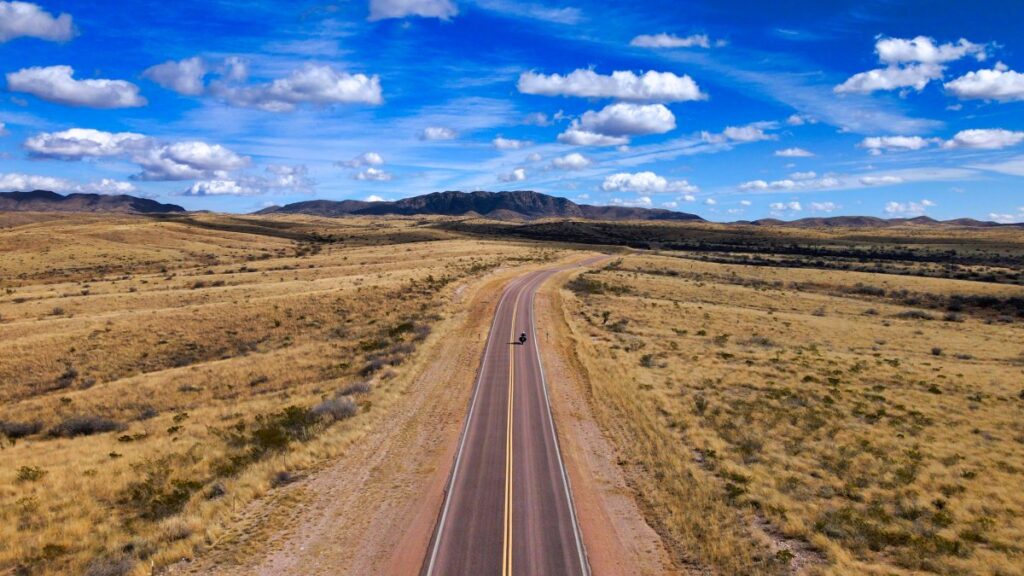 Sterling Noren riding his motorcycle on Gleeson Road near Tombstone, Arizona