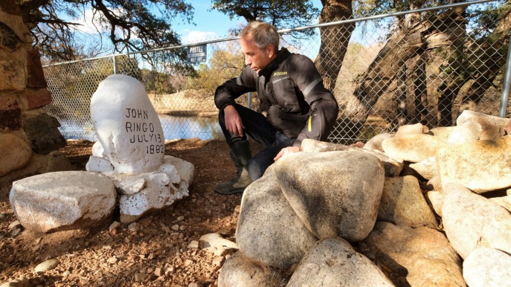 Sterling Noren at the gravesite of gunfighter Jonny Ringo