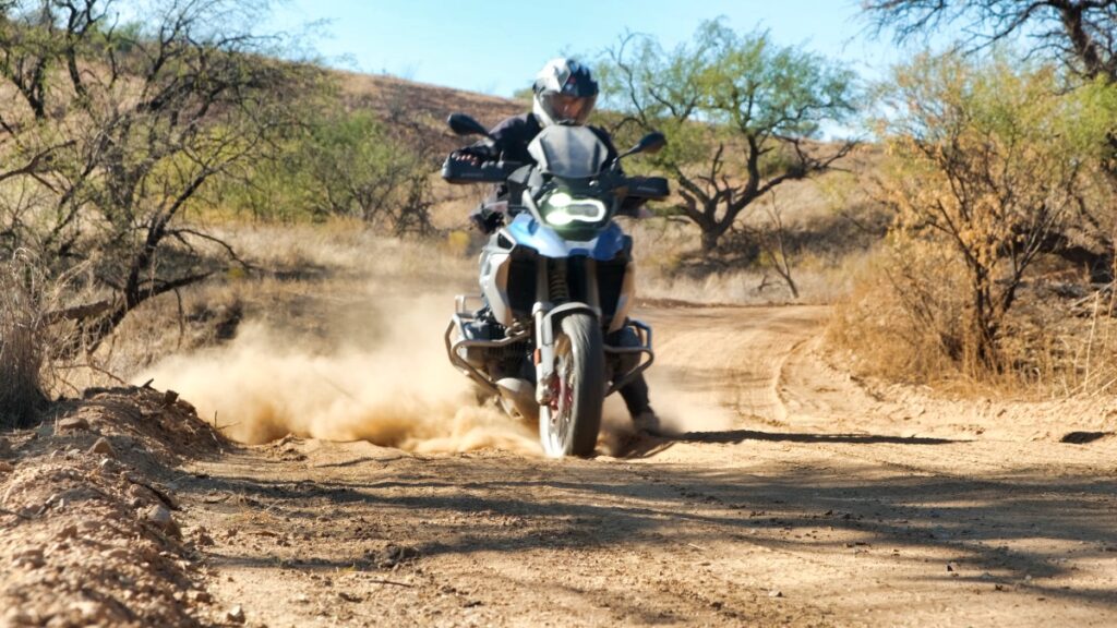 Sterling Noren riding BMW GS motorcycle in Buenos Aires National Wildlife Refuge 2020