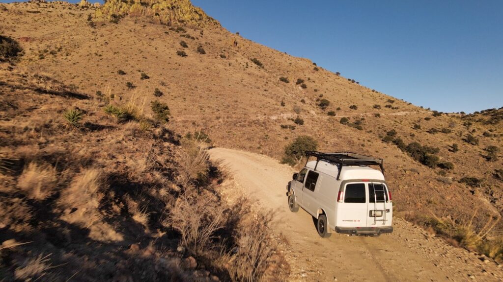 Sterling Noren Geronimo Trail 2021 van camping driving desert road