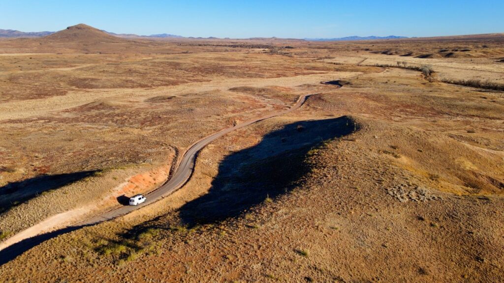 Sterling Noren Geronimo Trail 2021 van camping driving desert road