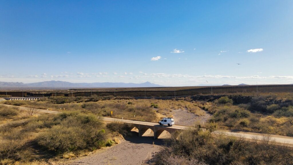 Sterling Noren Geronimo Trail 2021 van camping driving desert road US Mexico border wall