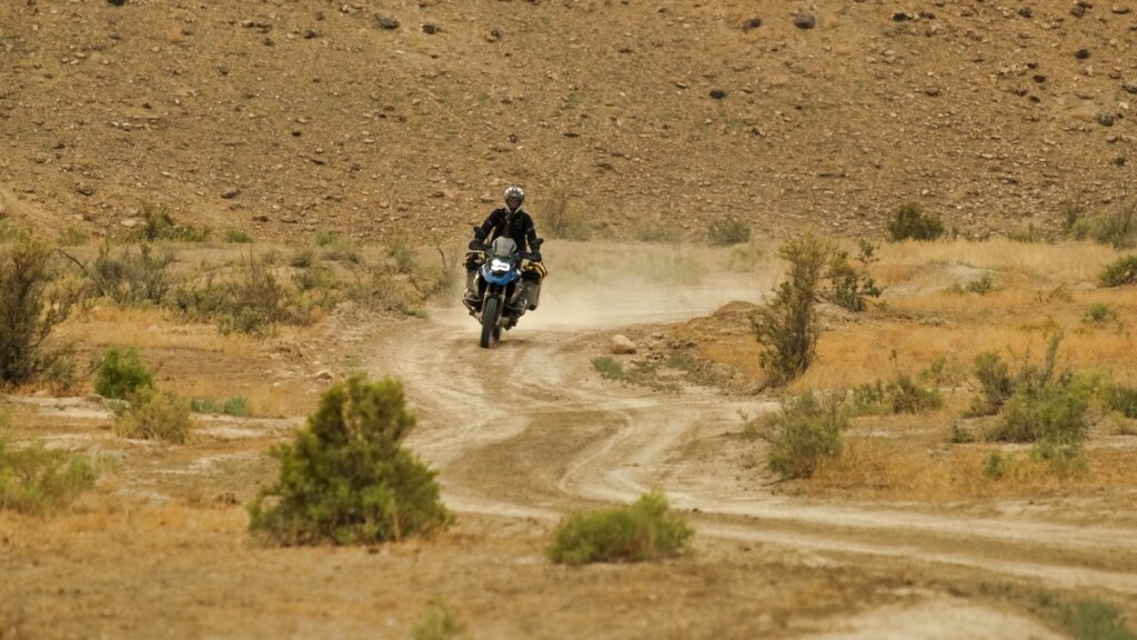 Sterling Noren riding motorcycle in Peach Valley OHV area Colorado