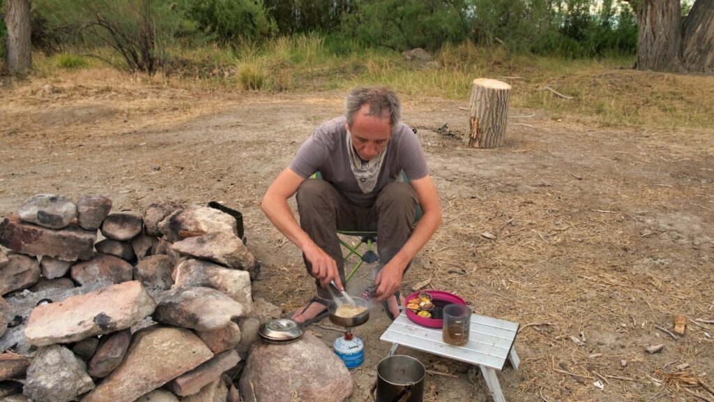 Cooking fish at camp site