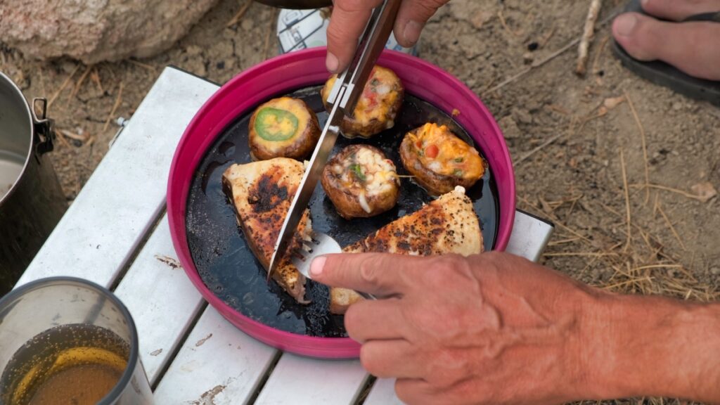 Cooking swordfish and stuffed mushrooms