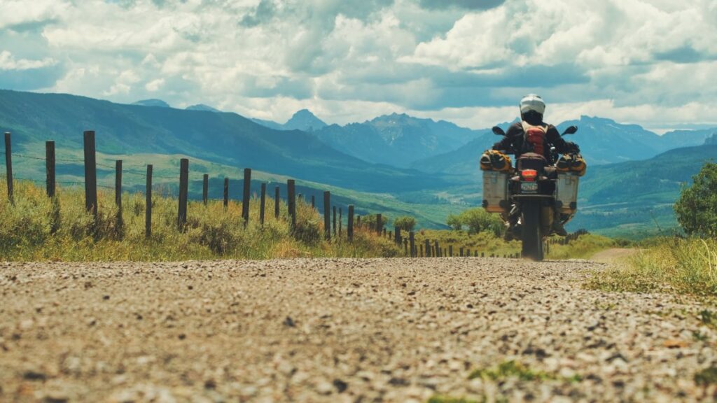 Sterling Noren riding BMW GS motorcycle in Ridgway Colorado