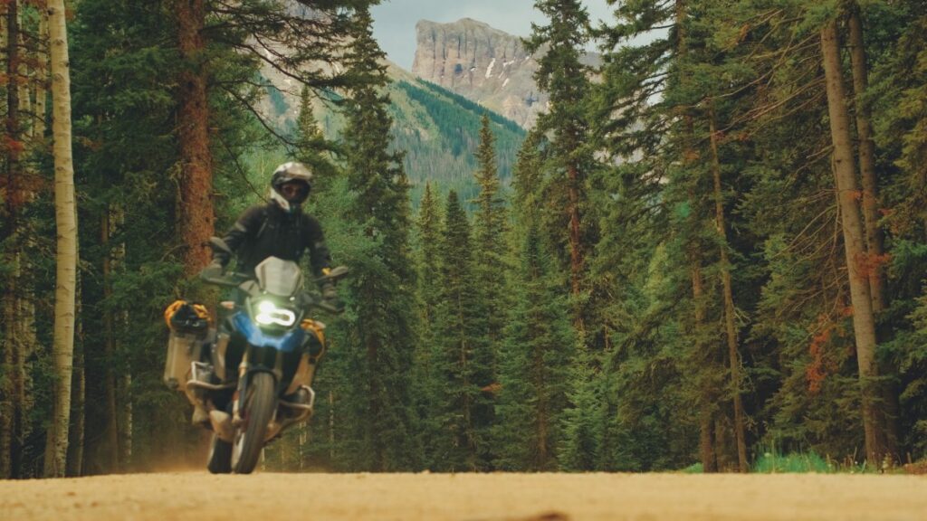 Sterling Noren riding BMW GS motorcycle in Colorado Owl Creek Pass Colorado