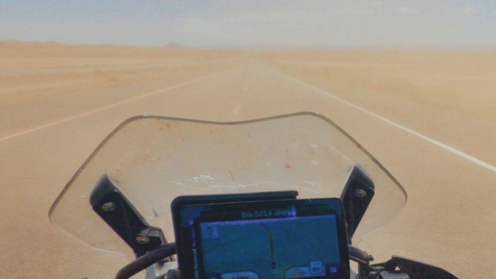 Riding motorcycle through dust storm in New Mexico