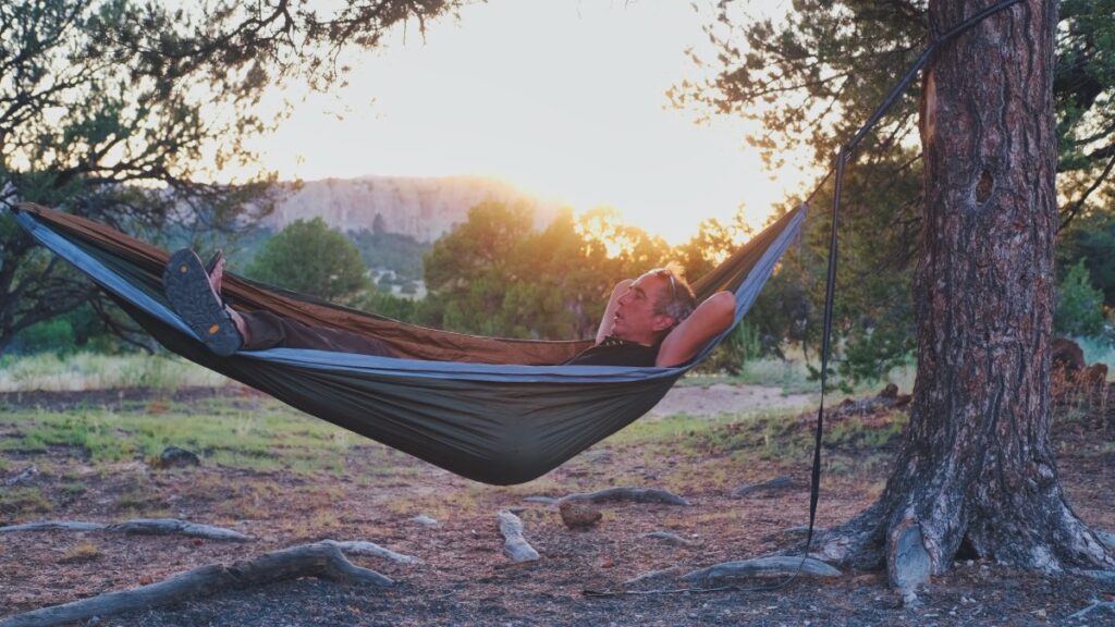 Sterling Noren laying in hammock