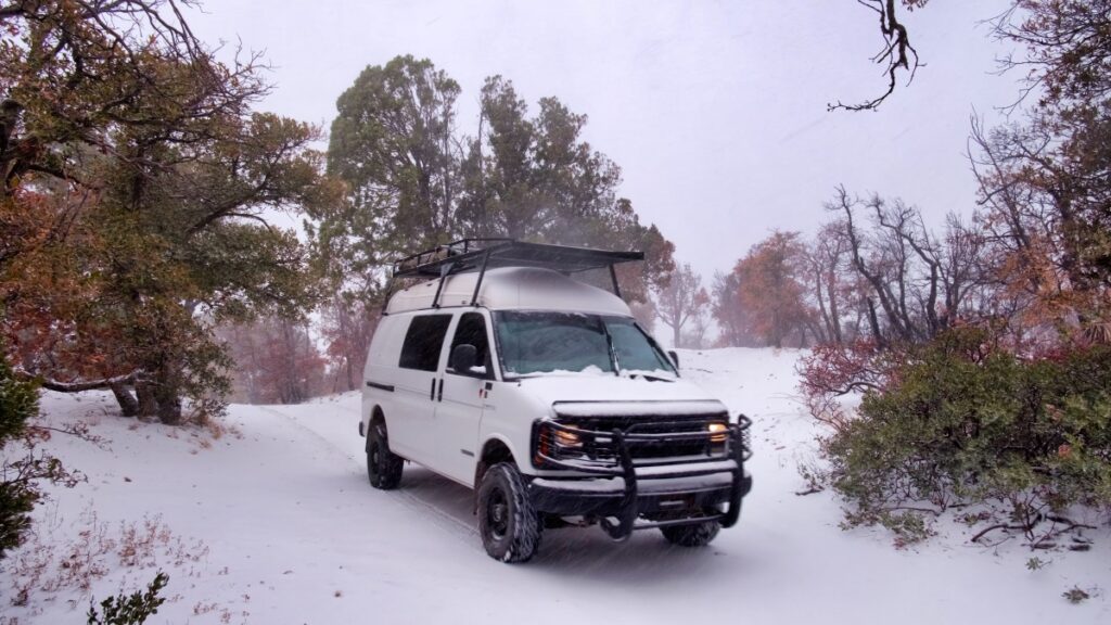 Van driving up Mount Lemmon near Tucson in winter snow