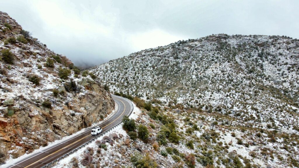 Van driving up Mount Lemmon near Tucson in winter